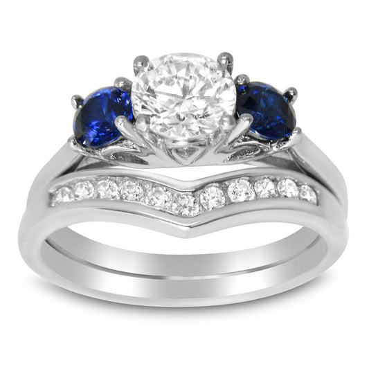 Front view of the women's sapphire bridal ring set, showing the engagement ring and matching wedding band on white.
