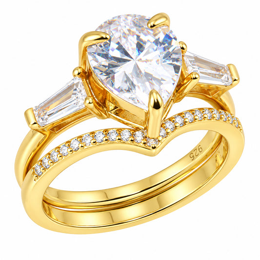 Left side view of 3 Carat Pear Cut White CZ 14K Gold Plated Silver Wedding and Engagement Ring Set