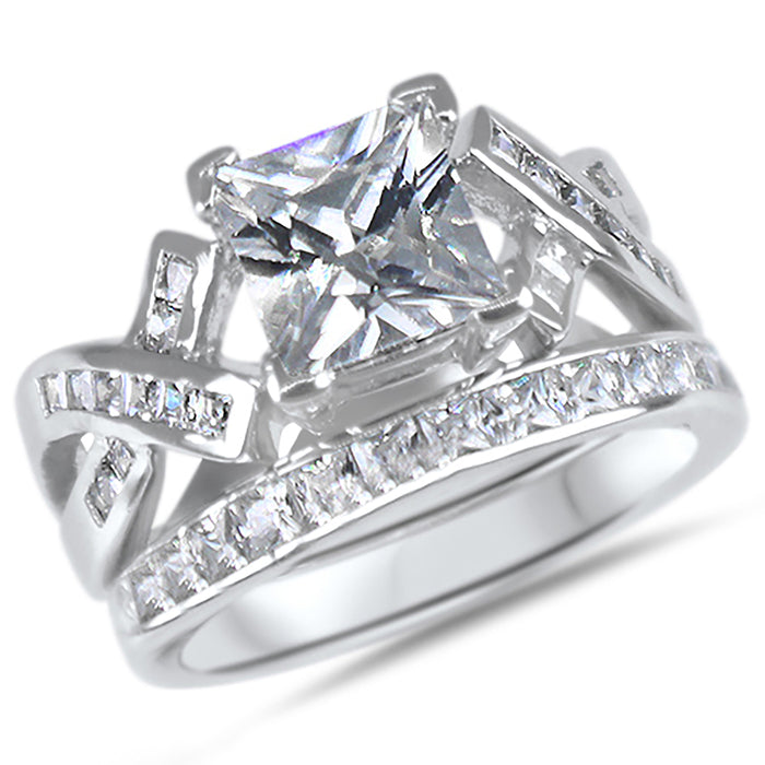 Front view of the women's cz bridal ring set, showing the engagement ring and matching wedding band on white.