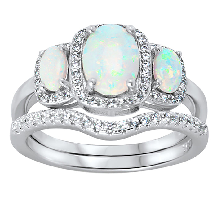 Front view of the women's white opal bridal ring set, showing the engagement ring and matching wedding band on white.