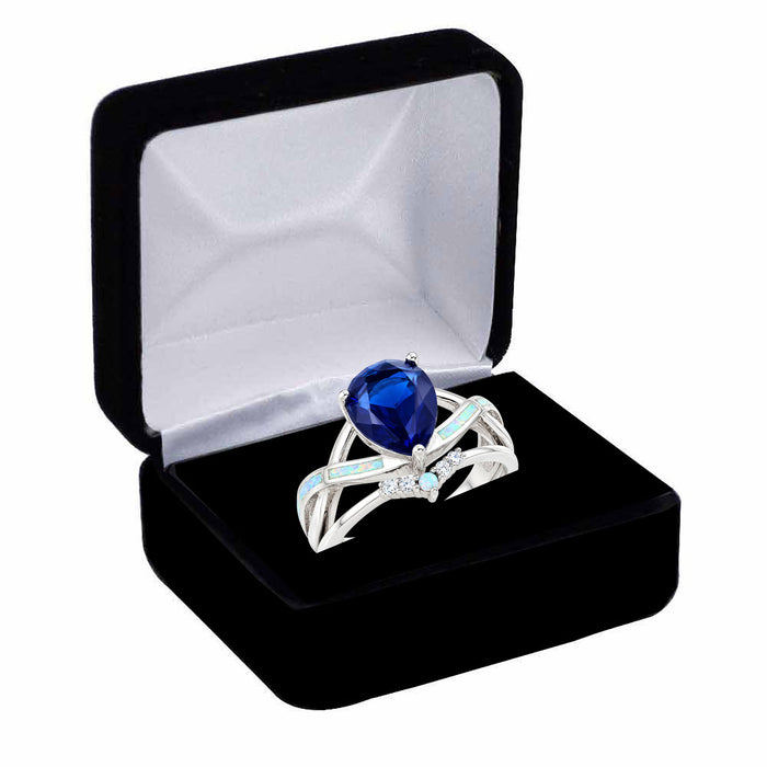 LaRaso & Co Sterling Silver 3 CT Blue Simulated Sapphire CZ White Opal CZ Wedding Ring Set